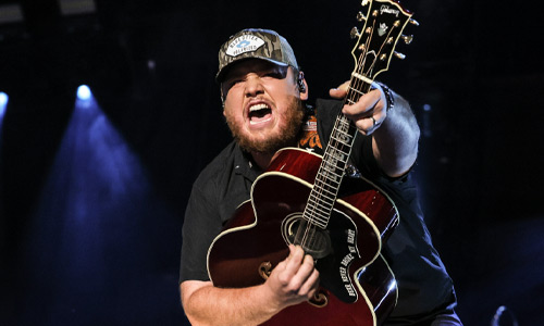 Luke Combs defends fan being sued for fake merch