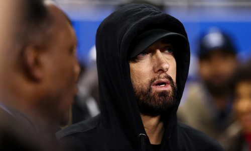 Eminem teases new music while at Lions game