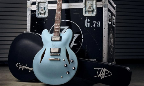 Dave Grohl showing off his signature Epiphone guitar